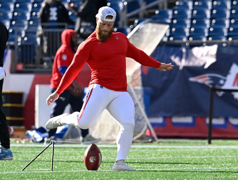 FILE PHOTO: Dec 1, 2024; Foxborough, Massachusetts, USA; New England Patriots place kicker Joey Slye (13) warms up before a game against the Indianapolis Colts at Gillette Stadium. Mandatory Credit: Eric Canha-Imagn Images/File Photo