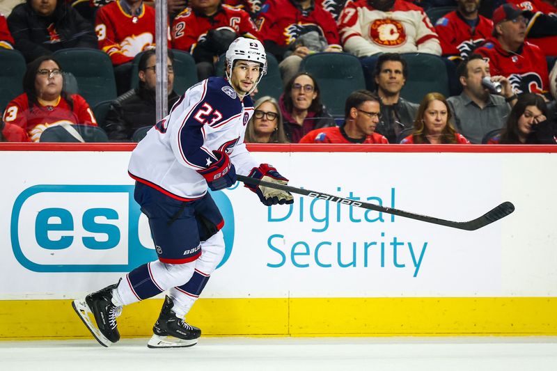 FILE PHOTO: Dec 3, 2024; Calgary, Alberta, CAN; Columbus Blue Jackets center Sean Monahan (23) skates against the Calgary Flames during the second period at Scotiabank Saddledome. Mandatory Credit: Sergei Belski-Imagn Images/File Photo