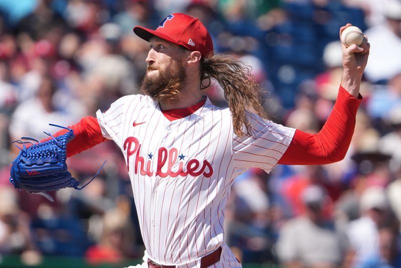 FILE PHOTO: Feb 27, 2025; Clearwater, Florida, USA; Philadelphia Phillies pitcher Matt Strahm (25) throws a pitch against the New York Yankees during the third inning at BayCare Ballpark. Mandatory Credit: Dave Nelson-Imagn Images/File Photo