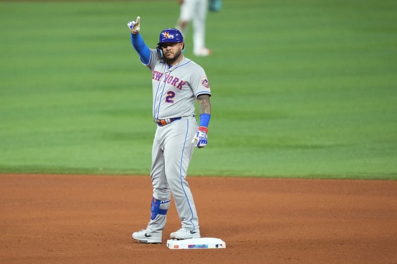 FILE PHOTO: Sep 20, 2023; Miami, Florida, USA;  New York Mets catcher Omar Narvaez (2) celebrates a double in the fourth inning against the Miami Marlins at loanDepot Park. Mandatory Credit: Jim Rassol-USA TODAY Sports/File Photo
