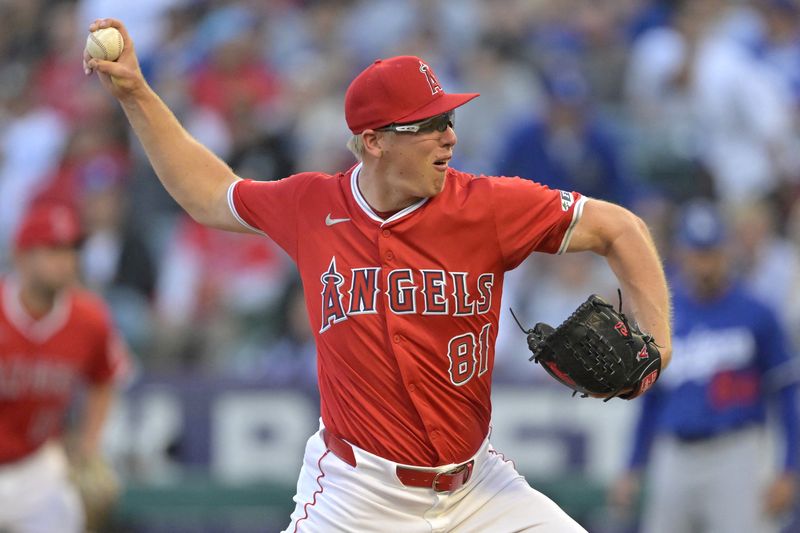 FILE PHOTO: Mar 24, 2025; Anaheim, California, USA;  Los Angeles Angels starting pitcher Ryan Johnson (81) delivers to the plate in the second inning against the Los Angeles Dodgers at Angel Stadium. Mandatory Credit: Jayne Kamin-Oncea-Imagn Images/File Photo
