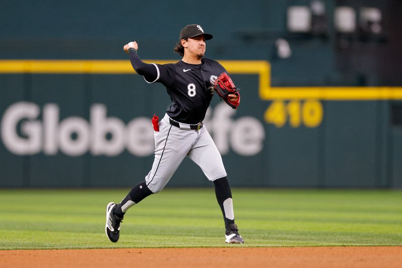 FILE PHOTO: Jul 23, 2024; Arlington, Texas, USA; Chicago White Sox short stop Nicky Lopez (8) make a play on a ground ball during the sixth inning against the Texas Rangers at Globe Life Field. Mandatory Credit: Andrew Dieb-USA TODAY Sports/File Photo