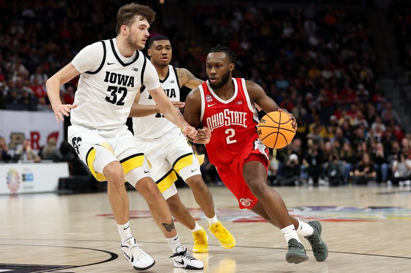 FILE PHOTO: Mar 14, 2024; Minneapolis, MN, USA; Ohio State Buckeyes guard Bruce Thornton (2) dribbles around Iowa Hawkeyes forward Owen Freeman (32) during the second half at Target Center. Mandatory Credit: Matt Krohn-USA TODAY Sports/File Photo