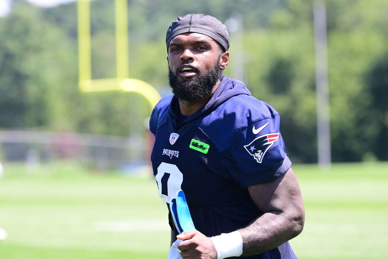 FILE PHOTO: Jul 26, 2024; Foxborough, MA, USA; New England Patriots linebacker Ja'Whaun Bentley (8) leaves the field after training camp at Gillette Stadium. Mandatory Credit: Eric Canha-USA TODAY Sports/File Photo