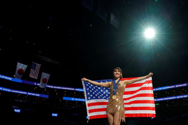 Figure Skating - ISU World Championships - TD Garden, Boston, Massachusetts, U.S. - March 28, 2025 Gold medallist Alysa Liu of the U.S. celebrates after winning the Women’s Figure Skating World Championships REUTERS/Brian Snyder