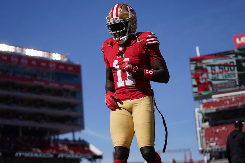FILE PHOTO: Oct 20, 2024; Santa Clara, California, USA; San Francisco 49ers wide receiver Brandon Aiyuk (11) walks on the field before the start of the game against the Kansas City Chiefs at Levi's Stadium. Mandatory Credit: Cary Edmondson-Imagn Images/File Photo