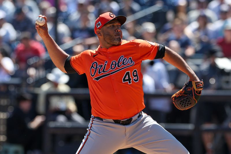 FILE PHOTO: Mar 11, 2025; Tampa, Florida, USA; Baltimore Orioles pitcher Albert Suarez (49) throws a pitch against the New York Yankees in the second inning during spring training at George M. Steinbrenner Field. Mandatory Credit: Nathan Ray Seebeck-Imagn Images/File Photo