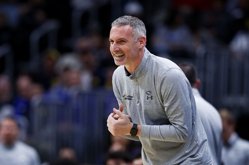 FILE PHOTO: March 20, 2025; Denver, CO, USA; UC San Diego Tritons head coach Eric Olen reacts during the second half against the Michigan Wolverines at Ball Arena. Mandatory Credit: Isaiah J. Downing-Imagn Images/File Photo