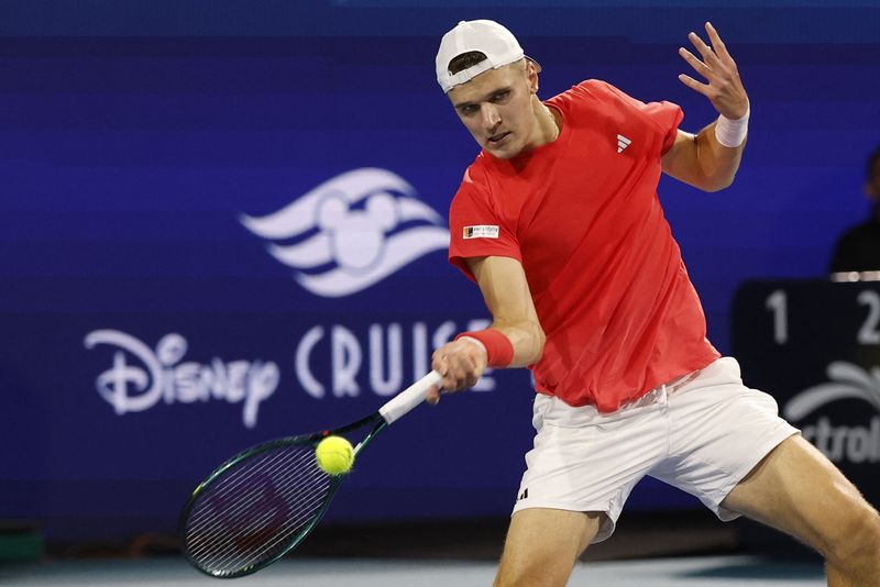 Mar 30, 2025; Miami, FL, USA; Jakub Mensik (CZE) hits a forehand against Novak Djokovic (SRB)(not pictured) in the men's singles championship of the Miami Open at Hard Rock Stadium. Mandatory Credit: Geoff Burke-Imagn Images