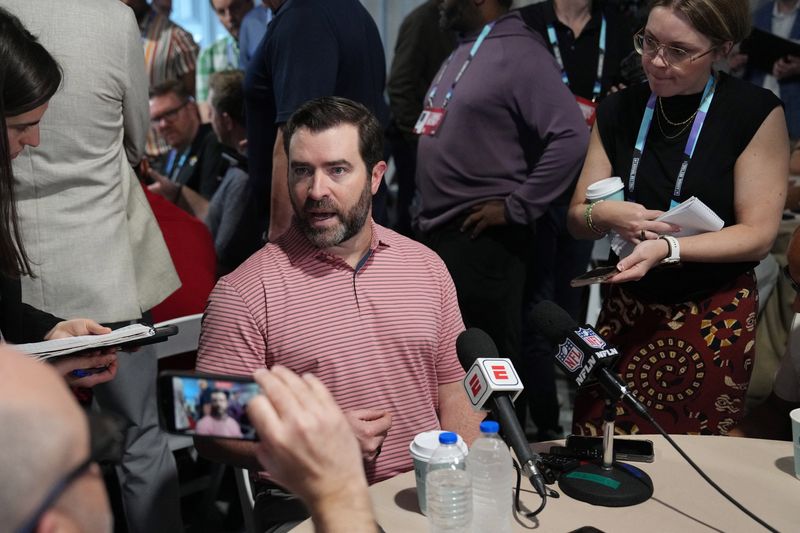 Mar 31, 2025; Palm Beach, FL, USA;  Tennessee Titans head coach Brian Callahan answers questions during the NFL Annual League Meeting at The Breakers. Mandatory Credit: Jim Rassol-Imagn Images