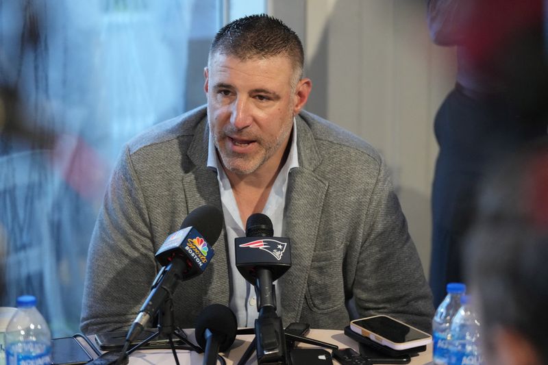 Mar 31, 2025; Palm Beach, FL, USA;  New England Patriots head coach Mike Vrabel answers questions from the media during the NFL Annual League Meeting at The Breakers. Mandatory Credit: Jim Rassol-Imagn Images