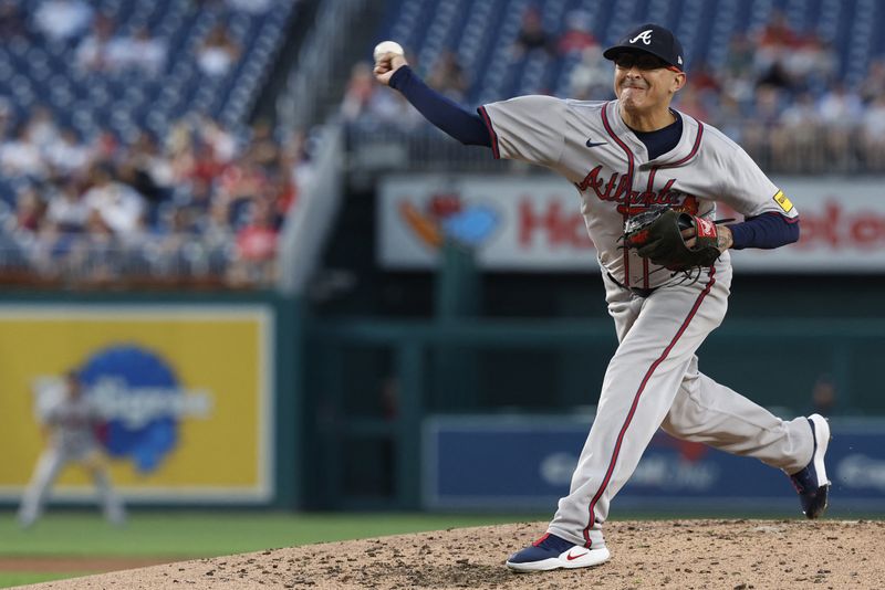 FILE PHOTO: Sep 10, 2024; Washington, District of Columbia, USA; Atlanta Braves pitcher Jesse Chavez (60) pitches against the Washington Nationals during the second inning at Nationals Park. Mandatory Credit: Geoff Burke-Imagn Images/File Photo