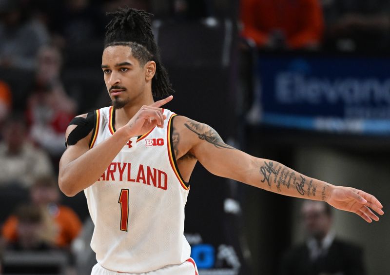 FILE PHOTO: Mar 14, 2025; Indianapolis, IN, USA; Maryland Terrapins guard Rodney Rice (1) celebrates after a play during the first half against the Illinois Fighting Illini at Gainbridge Fieldhouse. Mandatory Credit: Robert Goddin-Imagn Images/File Photo