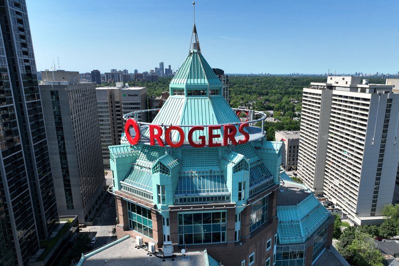 FILE PHOTO: The Rogers Building, the green-topped corporate campus of Canadian media conglomerate Rogers Communications is seen in downtown Toronto, Ontario, Canada July 9, 2022.  REUTERS/Chris Helgren/File Photo