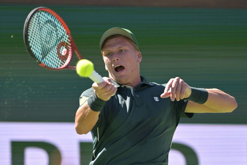 FILE PHOTO: Mar 9, 2025; Indian Wells, CA, USA;  Jenson Brooksby (USA) hits a shot against Jack Draper (not pictured) during the BNP Paribas Open at the Indian Well Tennis Garden. Mandatory Credit: Jayne Kamin-Oncea-Imagn Images/File Photo