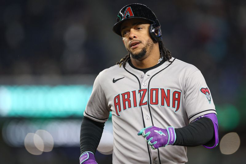 FILE PHOTO: Apr 2, 2025; Bronx, New York, USA; Arizona Diamondbacks second baseman Ketel Marte (4) reacts after hitting an RBI singe during the second inning against the New York Yankees at Yankee Stadium. Vincent Carchietta-Imagn Images/File Photo