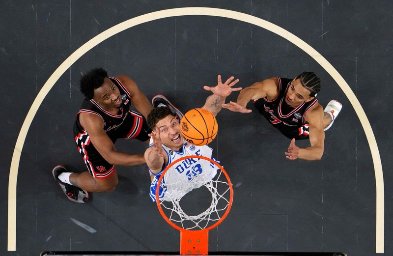 Apr 5, 2025; San Antonio, TX, USA; Duke Blue Devils forward Mason Gillis (18) reaches for the ball against Houston Cougars guard L.J. Cryer (4) and guard Milos Uzan (7) during the first half in the semifinals of the men's Final Four of the 2025 NCAA Tournament at the Alamodome. Mandatory Credit: Bob Donnan-Imagn Images