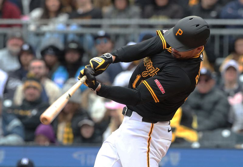 Apr 6, 2025; Pittsburgh, Pennsylvania, USA;  Pittsburgh Pirates designated hitter Bryan Reynolds (10) hits a two run double against the New York Yankees during the third  inning at PNC Park. Mandatory Credit: Charles LeClaire-Imagn Images
