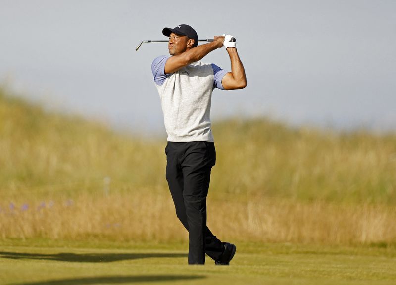 FILE PHOTO: Golf - The 152nd Open Championship - Royal Troon Golf Club, Troon, Scotland, Britain - July 15, 2024 Tiger Woods of the U.S. during a practice round Action Images via Reuters/Jason Cairnduff/File Photo