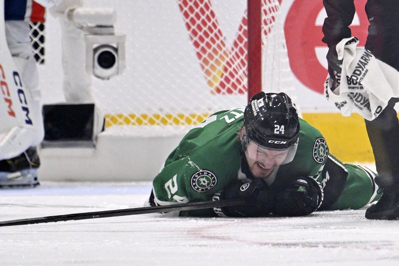 FILE PHOTO: May 23, 2025; Dallas, Texas, USA; Dallas Stars center Roope Hintz (24) reacts after being injured against the Edmonton Oilers in the third period for game two of the Western Conference Final of the 2025 Stanley Cup Playoffs at American Airlines Center. Mandatory Credit: Jerome Miron-Imagn Images