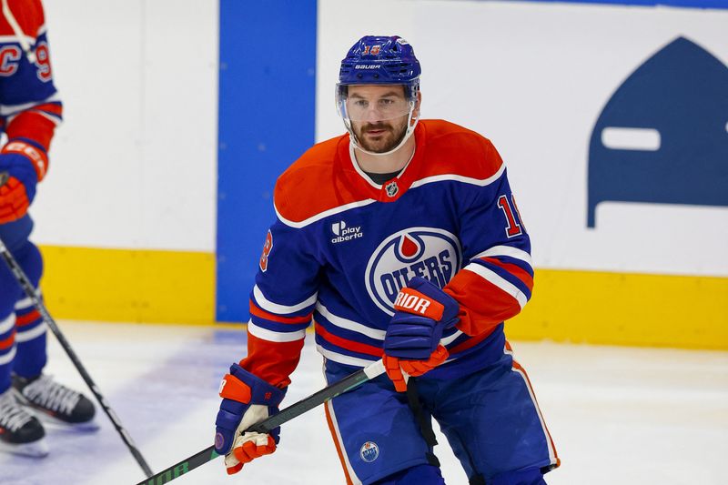 FILE PHOTO: May 27, 2025; Edmonton, Alberta, CAN; Edmonton Oilers left wing Zach Hyman (18) skates in warmup prior to the game against the Dallas Stars in game four of the Western Conference Final of the 2025 Stanley Cup Playoffs at Rogers Place. Hyman leaves game in first period and will not return. Mandatory Credit: Perry Nelson-Imagn Images/File Photo
