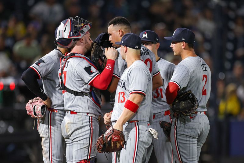 May 27, 2025; Tampa, Florida, USA; Minnesota Twins catcher Ryan Jeffers (27) talks to Minnesota Twins pitcher Jhoan Duran (59) against the Tampa Bay Rays in the ninth inning at George M. Steinbrenner Field. Mandatory Credit: Nathan Ray Seebeck-Imagn Images