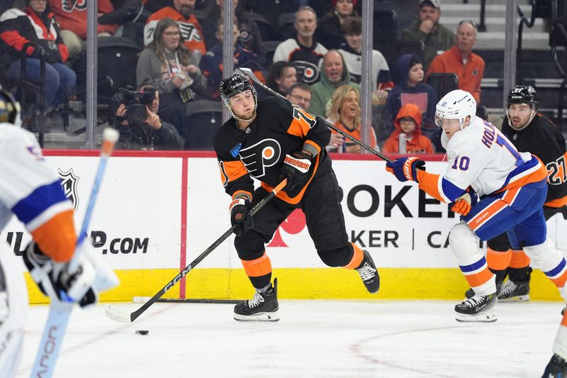 FILE PHOTO: Apr 12, 2025; Philadelphia, Pennsylvania, USA; Philadelphia Flyers right wing Tyson Foerster (71) controls the puck against the New York Islanders in the second period at Wells Fargo Center. Mandatory Credit: Kyle Ross-Imagn Images/File Photo