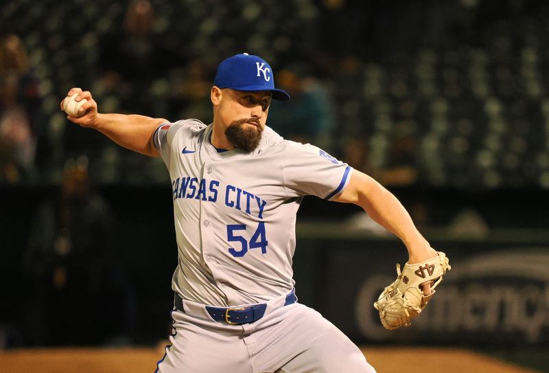 FILE PHOTO: Jun 19, 2024; Oakland, California, USA; Kansas City Royals relief pitcher Dan Altavilla (54) pitches the ball against the Oakland Athletics during the seventh inning at Oakland-Alameda County Coliseum. Mandatory Credit: Kelley L Cox-USA TODAY Sports/File Photo