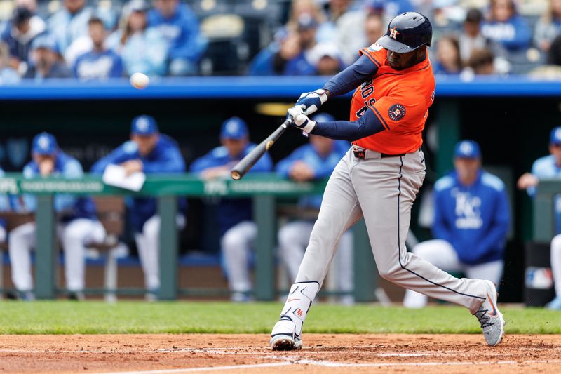 FILE PHOTO: Apr 27, 2025; Kansas City, Missouri, USA; Houston Astros outfielder Yordan Alvarez (44) hits a home run during the third inning against the Kansas City Royals at Kauffman Stadium. Mandatory Credit: William Purnell-Imagn Images/File photo