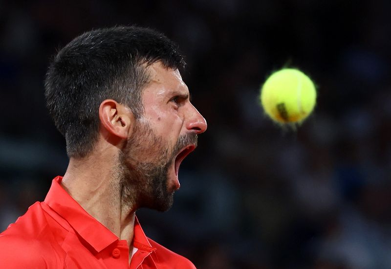 FILE PHOTO: Tennis - French Open - Roland Garros, Paris, France - May 31, 2025 Serbia's Novak Djokovic reacts during his third round match against Austria's Filip Misolic REUTERS/Lisi Niesner/File Photo