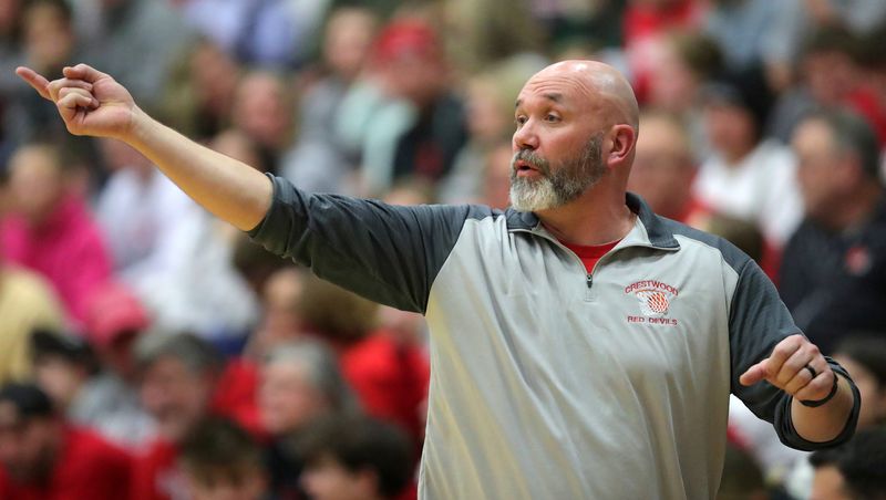 Crestwood basketball coach Josh Jakacki works the sideline during the second half of a high school basketball game at Hiram College on Saturday, Jan. 18, 2025, in Hiram, Ohio.