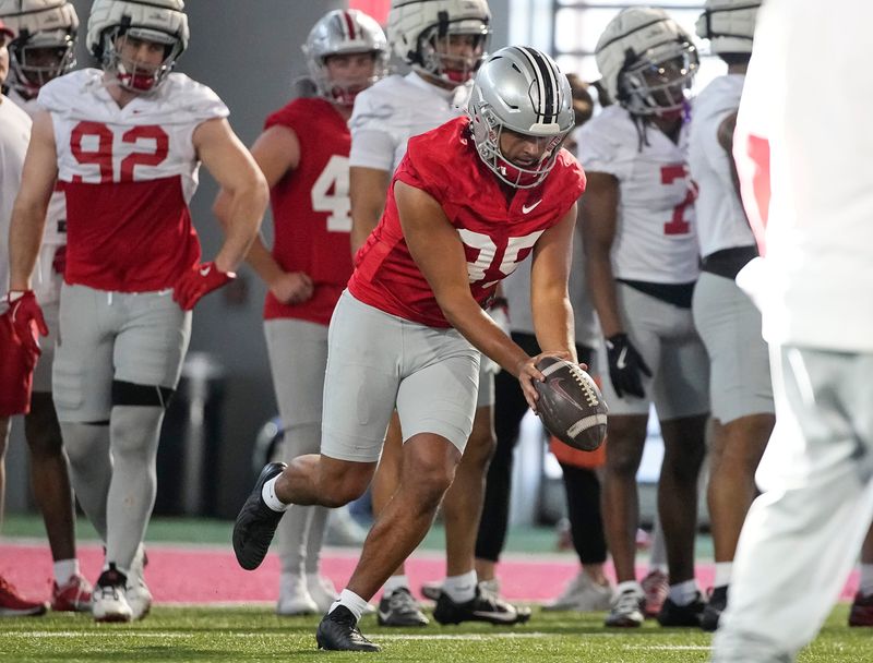 Ohio State Buckeyes punter Anthony Venneri (35) kicks during spring football practice at the Woody Hayes Athletic Center in Columbus on March 17, 2025.