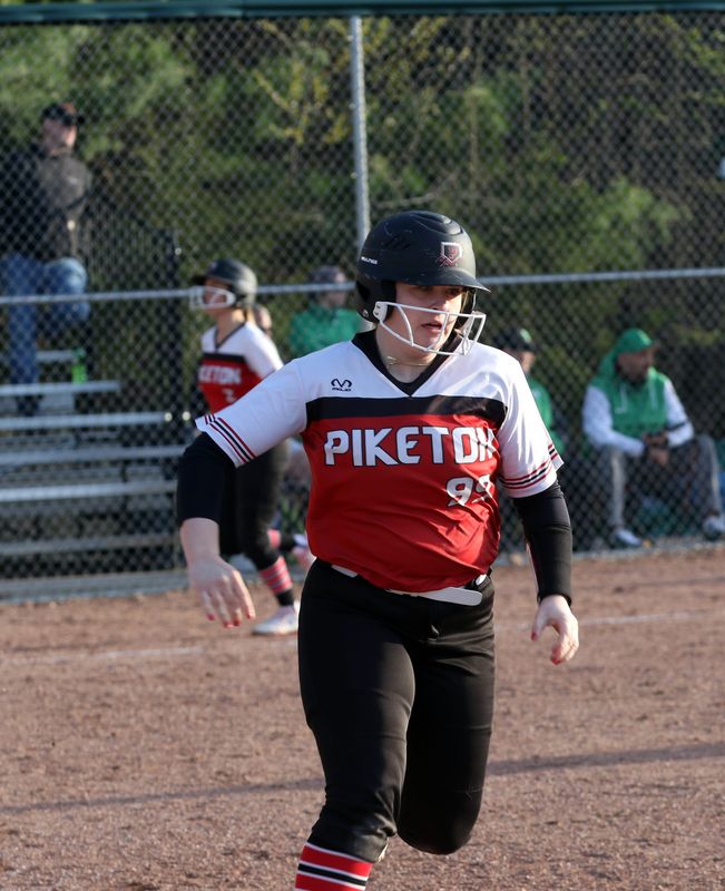 Piketon's Kyndall Carroll (99) runs to first base in the game against Huntington on Wednesday, April 16, 2025, at Huntington HIgh School.