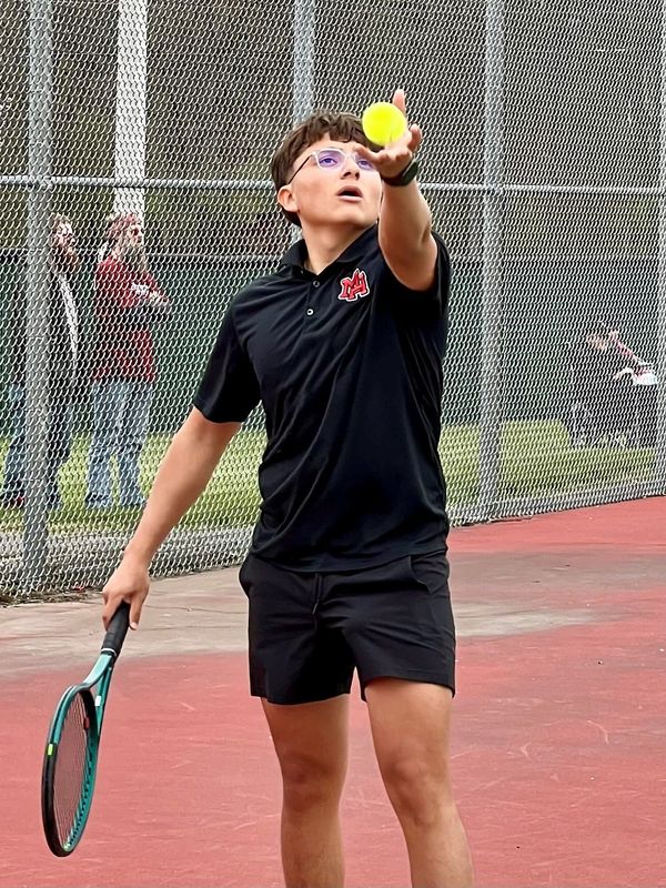 Marion Harding's Sebastian Lisiecki gets ready to serve in a first singles match at Pleasant earlier this season. The Presidents are trying to win the MOAC team title the week of May 12.