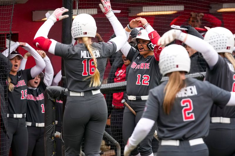Ohio State Buckeyes Reagan Milliken (16) celebrates with teammates after hitting a three-run home run during the game against the Oakland Golden Grizzlies at Buckeye Field on Friday, March 7, 2025 in Columbus, Ohio.