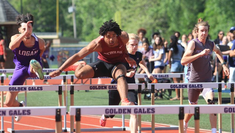Newark's Roy Price Jr. leads the 110-meter hurdles during the final day of the Ohio Capital Conference-Buckeye Division championships at Lancaster's Fulton Field on May 17, 2025.