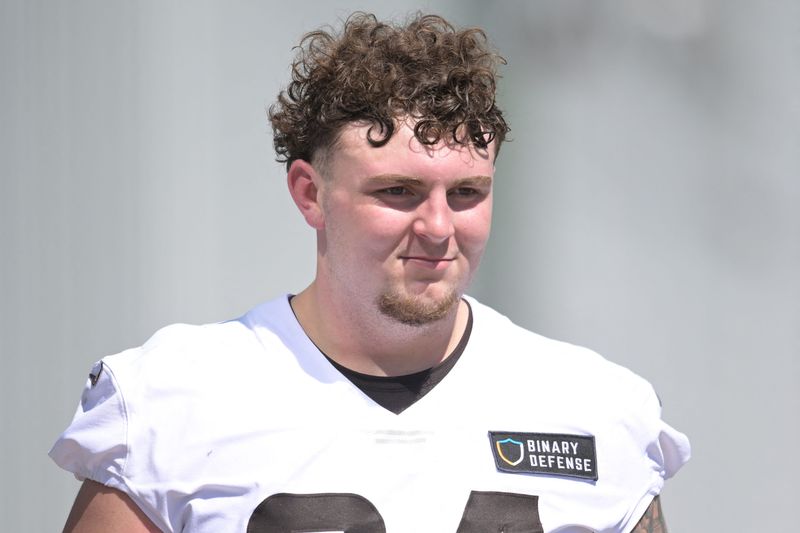 Browns defensive tackle Mason Graham walks off the field after Day 1 of rookie minicamp May 9, 2025, in Berea.
