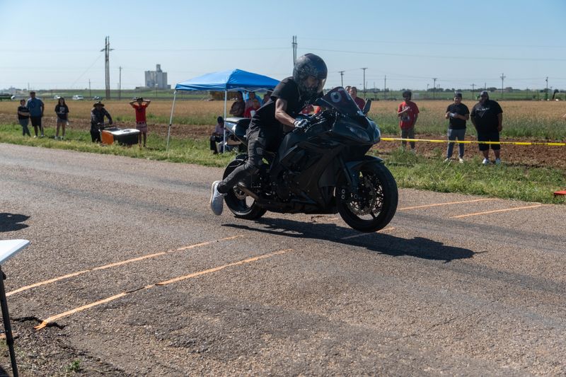 A motorcycle takes off on a time trial Friday at the DadFest event in Hereford.