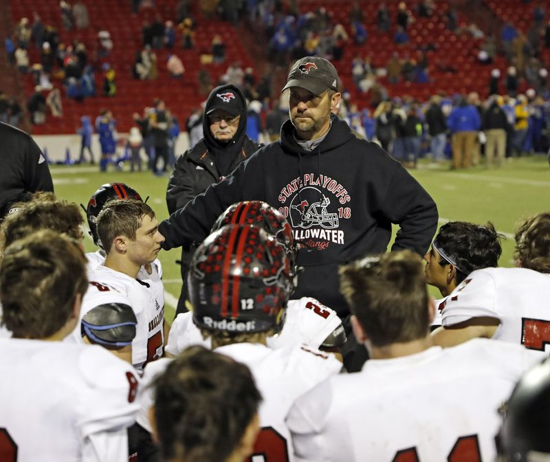 Shallowater coach Bryan Wood talks to his players after a 2018 state quarterfinal against Brock. The Mustangs, 7-5 last season, will face several unfamiliar opponents this year after the UIL realignment moved them into District 1-3A Division I.