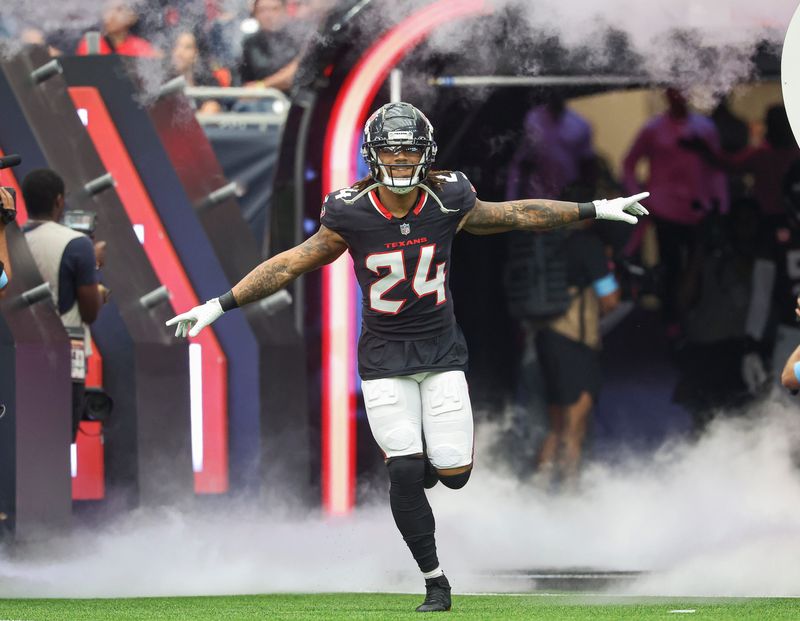 Oct 27, 2024; Houston, Texas, USA; Houston Texans cornerback Derek Stingley Jr. (24) runs onto the field before the game against the Indianapolis Colts at NRG Stadium. Mandatory Credit: Troy Taormina-Imagn Images