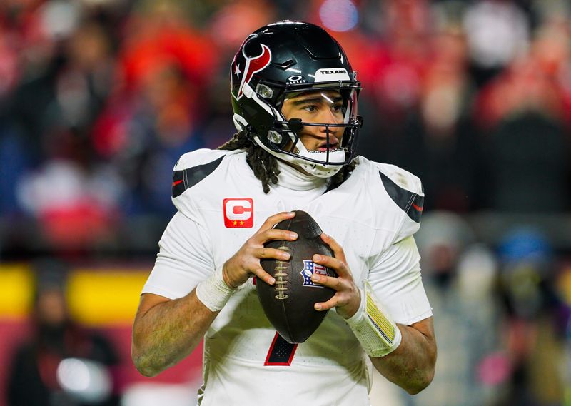 Jan 18, 2025; Kansas City, Missouri, USA; Houston Texans quarterback C.J. Stroud (7) drops back to pass during the second half against the Kansas City Chiefs in a 2025 AFC divisional round game at GEHA Field at Arrowhead Stadium. Mandatory Credit: Jay Biggerstaff-Imagn Images