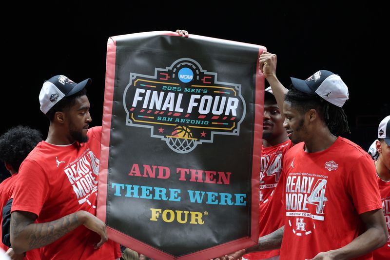 Mar 30, 2025; Indianapolis, IN, USA; The Houston Cougars react on the stage after defeating the Tennessee Volunteers during the Midwest Regional final of the 2025 NCAA tournament at Lucas Oil Stadium. Mandatory Credit: Trevor Ruszkowski-Imagn Images