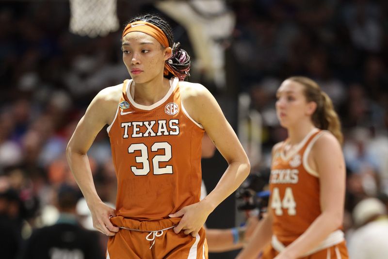 Apr 4, 2025; Tampa, FL, USA; Texas Longhorns guard Ndjakalenga Mwenentanda (32) reacts during the first half in a semifinal of the women's 2025 NCAA tournament against the South Carolina Gamecocks at Amalie Arena. Mandatory Credit: Nathan Ray Seebeck-Imagn Images