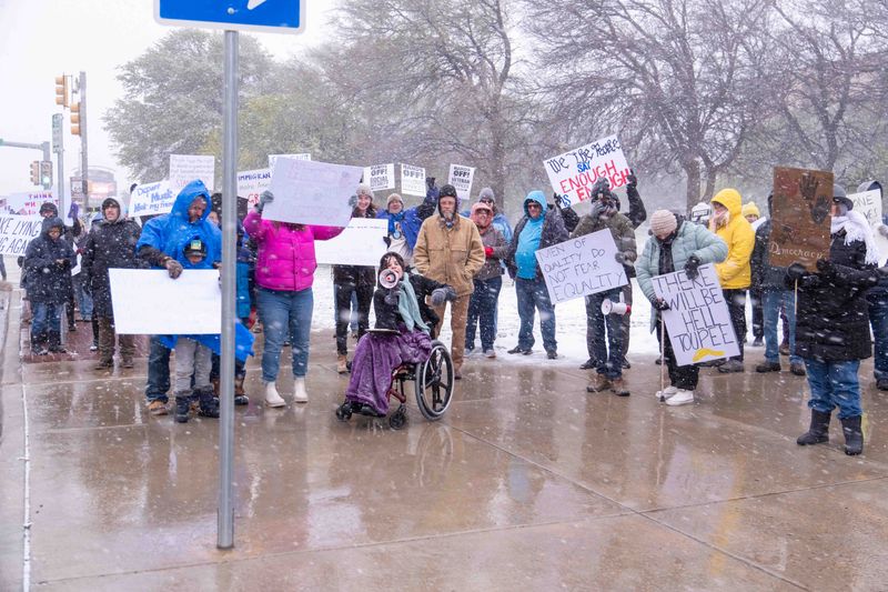 Local protesters gather for a "Hands Off Rally" targeting Donald Trump and Elon Musk Saturday morning outside of the old Amarillo City Hall in downtown Amarillo.