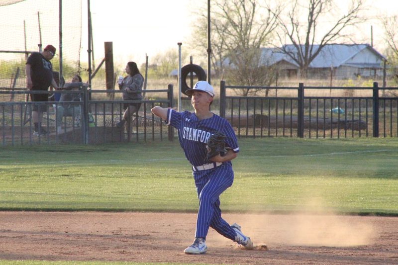 Stamford's Christian Duran fields a ground ball at shortstop and throws toward first base during the Bulldogs' District 8-2A baseball game against the Hawley Bearcats on Tuesday, April 8, at Hawley High School. Stamford won 3-1.