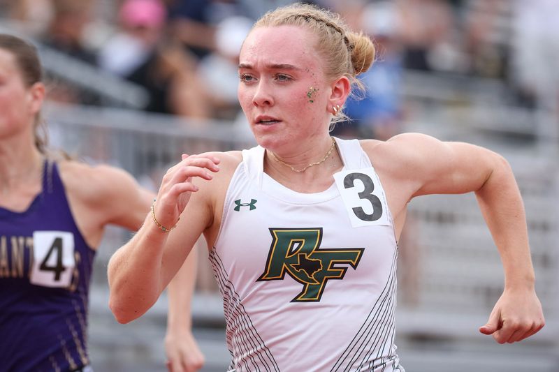 Rockport-Fulton’s Adyson Burton finishes first in the 400-meter race during the Region IV 2A-4A meet in Kingsville, Texas, on April 19, 2025.
