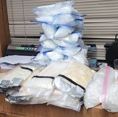 A DPS Trooper found several packages of suspected methamphetamine in a large plastic container and rubber-banded cash in a bag after a 2018 Nissan heading east on I-40 near Vega was stopped for a traffic violation May 5.