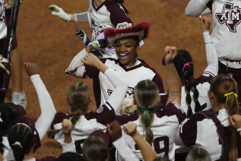 Texas A&M is 15th in the country in total runs, led by Kennedy Powell (center), the leadoff hitter who's scored 58 times in 54 games.