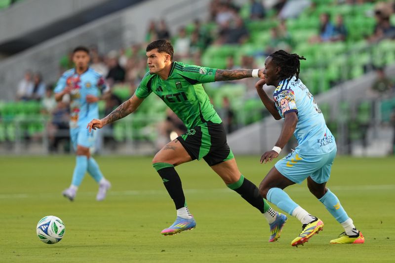 Austin FC forward Brandon Vazquez dribbles past El Paso Locomotive FC defender Wahab Ackwei during the first half of Wednesday's first-round U.S. Open Cup match at Q2 Stadium.