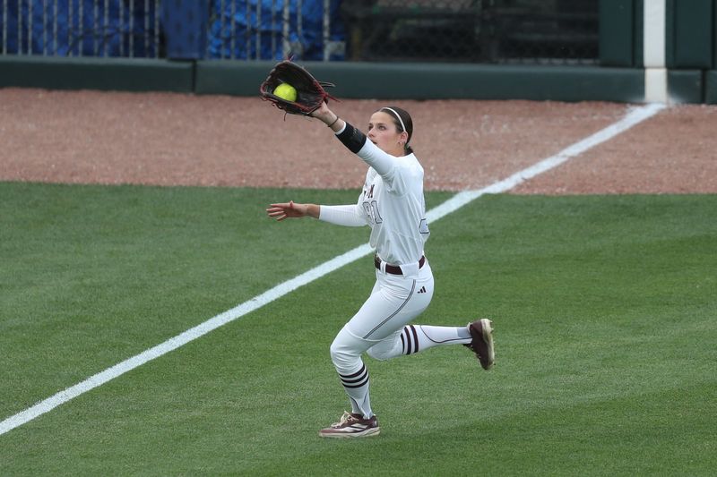 May 9, 2025; Athens, GA, USA; Texas A&M outfielder Kramer Eschete (91) catches the ball for an out during a game against Texas at Jack Turner Stadium. Mandatory Credit: Mady Mertens-Imagn Images